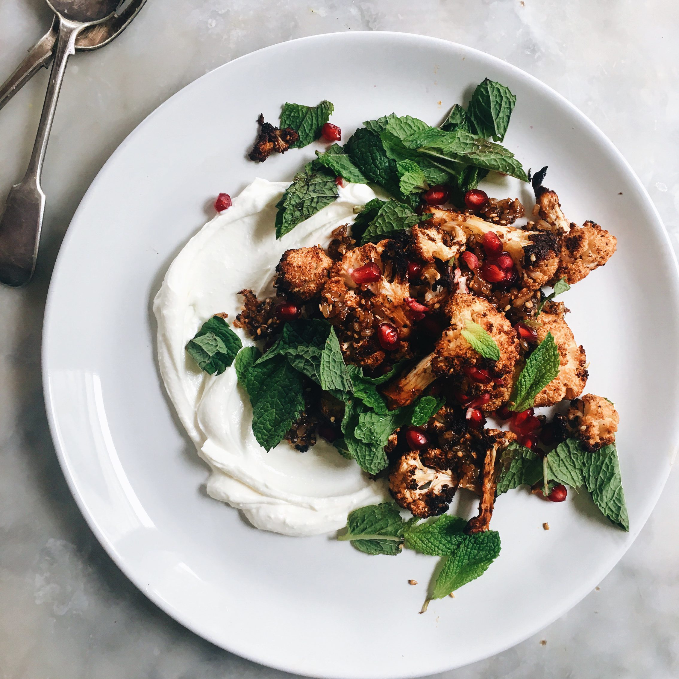 ZA'ATAR ROASTED CAULIFLOWER WITH SPICED RICE, MINT, POMEGRANATE AND ...